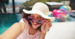 Happy child, sunglasses or face in selfie for travel, picture memories or fun at resort poolside. Young girl, relax or outdoor with smile for photography, summer vacation or positive vibes on holiday