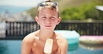 Eating, ice cream or face of kid by pool for summer, holiday or travel in hotel for outdoor tourism. Relax, portrait or boy child tasting vanilla sucker, popsicle or frozen snack on weekend vacation