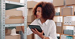 Tablet, ecommerce and woman in warehouse by boxes with online inventory, checklist or order. Digital technology, logistics and female distributor reading parcel information for package shipping.