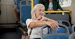 Delay, time and mature woman on bus for commute, public transportation or travel in city. Late, waiting and watch with passenger in vehicle for impatience on adventure, journey or trip to location
