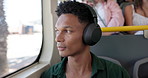Man, headphones and listening with music in bus for travel, audio streaming or commute in city. Male person, sound and relax with podcast in vehicle for public transportation or tourism in urban town