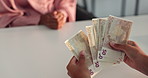 Person, hands and counting with money for loan, borrow or cash salary at office desk. Closeup, employer or accountant with euro bills or payment for profit, investment or company raise at workplace