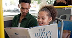 Travel, book and dad with child on bus reading together for entertainment, bonding and connection. Happy, fantasy and girl kid with father for storytelling with commuting on public transport together