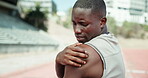 Athlete, black man and shoulder pain of fitness at stadium for sports mistake, arthritis risk and emergency. Male person, massage and anatomy for osteoporosis, muscle sprain and exercise fail of race