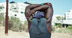 Stretching, arms and sports with black man in stadium for runner athlete, competition practice and track event. Wellness, warm up and running with person in field arena for fitness and training 