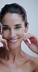 Studio, skincare and mature woman for anti aging cosmetics, smooth results and transformation. Dermatology, salon and portrait of person for facial, wellness and natural texture on white background