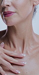 Hands, cosmetics and touch neck in studio with results, change and process for dermatology by background. Person, model and check for anti aging, beauty and wrinkles for skincare with natural glow