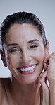 Happy, skincare and mature woman on a white background for anti aging cosmetics, results and transformation. Dermatology, salon and portrait of person for facial, wellness and texture in studio