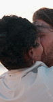 Love, couple and happy with kissing outdoor for romantic date, anniversary and bonding together. Flare, sunset and interracial people with affection in nature for relationship, loyalty and commitment