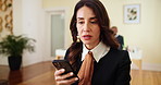 Business,  cellphone and woman in office, laptop and connection with email notification. Reporter, person and employee in workplace, journalist and editor for magazine, smartphone and social media
