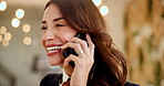 Happy woman, talking or laughing with phone call for communication or conversation at travel agency. Female person, consultant or reservation agent with smile on mobile smartphone for trip discussion