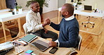 Excited, businessmen and handshake with laptop for good news, winning or team promotion at office desk. Male people, happy coworkers or shaking hands with computer for achievement, deal or success
