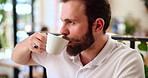 Thinking, coffee and business man in cafe for relaxing, break and thoughtful for remote working job. Restaurant, freelance worker and person with drink, cappuccino and beverage for career inspiration