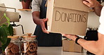 Cafe, hands and men with produce, donations and inventory for sustainable business aid. Teamwork, box and NGO for food distribution or volunteer project portrait at community humanitarian coffee shop