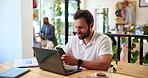 Man, cafe and phone with texting for freelancer, financial consultant and communication. Entrepreneur, remote work and graph discussion for feedback, networking or business project at coffee shop