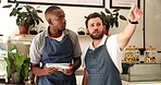 Men, waiter and talk on tablet at cafe for planning, online order and booking of menu update. People, explaining and digital app of inventory management, review customer service and sales performance