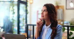 Laptop, thinking and business woman in cafe for investment opportunity, idea or financial decision. Computer, coffee shop and freelancer planning for remote work, problem solving or happy for insight