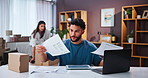 Stress, paperwork and dropshipping with couple at home for startup, invoice documents and mistake. Refund policy, anxiety and delivery delay with frustrated man and woman for ecommerce and cargo
