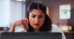 Box, laptop and small business with confused Indian woman in home office for freelance delivery. Computer, logistics and problem solving with supply chain entrepreneur in apartment for remote work