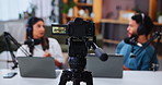 Podcast, camera and screen with influencer host with discussion, interview and streaming service broadcast. Equipment, tech and recording with people for question or content creation for platforms