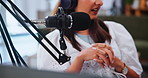 Woman, hands and talk show with mic for broadcast, live recording or online streaming at home studio. Closeup, female person or influencer with technology for news channel, radio or audio message