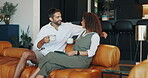 Happy, relax and couple with coffee, home and remote work with tablet in living room, romance and smile. Bonding, man and woman with tea in morning, love and conversation with partner in lounge
