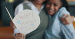Mothers day, card and mom hug child in home for bonding, relationship and thank you for gift. Family, love and happy parent with girl embrace for affection, support and celebrate in living room