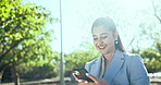 Laughing, outdoor and woman with phone, reading and excited for job promotion on email or commuting. Happy, travel and person with smile for career growth, digital and employee with tech for message