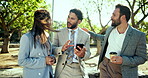 Commute, conversation and phone with business people in park together for good news communication. App, notification or social media with man and woman employee group outdoor for email or update