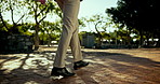 Happy man, shoes or walking with dancing feet for business success, music or good morning in city. Businessman, energy and rhythm with legs in fashion for fun hip hop, mood or funk in an urban town