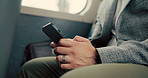 Bus, typing and hands of businessman with phone in city for journey, commute and travel. Public transport, passenger and person on smartphone for contact, networking and email on vehicle in town