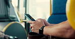 Bus, travel and man with cellphone, hands and typing with social media, app and commute. Closeup, morning and person with smartphone, internet and communication with message to contact or mobile user