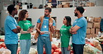 Volunteer, group and people in warehouse for charity, inventory discussion and food bank checklist. Donation, help and community service at storehouse with manager planning or delegation for delivery