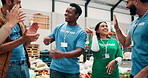Happy people, volunteer and high five with applause for community service, charity or teamwork at NGO warehouse. Group, employees or clapping with smile for social responsibility, donation or success