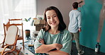Happy woman, face and confidence with paint for home DIY, maintenance or interior design together. Portrait, female person or smile with arms crossed for house improvement, makeover or renovation