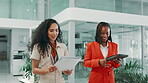Women, walk and document on tablet in office with feedback, financial report and project research. People, talk and digital with paperwork for planning budget, investment proposal and schedule update