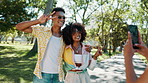 Photography, nature and couple hugging in park for memory, bonding or adventure together. Happy, peace sign and man with woman for picture outdoor in garden for social media post for relationship.