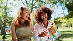 Laughing, nature and girl friends with phone in conversation for celebrity gossip with online blog. Happy, social networking and women with cellphone browsing media online for funny post outdoor.