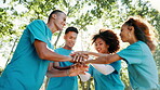 Park, people and huddle with hands for volunteering, motivation or success for community service. Team, men and women with applause for support, celebrate or excited for social responsibility program