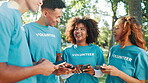 Smartphone, volunteer and group of people in park for charity event, community service and teamwork. Laughing, NGO and men with women on phone for social media, internet joke or online coordination