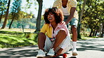 Skateboard, students and friends with woman in park for college vacation, spring break and urban fashion. Balance, push and energy with people in nature for skating, gen z youth and streetwear style