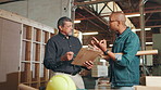 Men, carpenter and clipboard for talk at workshop with design, insight or advice in industry for yacht building. People, mentor and checklist for steps, question or manufacturing with wood at factory