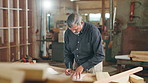 Carpentry, woodwork and man in workshop on laptop for client orders, measure furniture and manufacturing. Factory, construction and person on computer for lumber, timber inventory and wood production