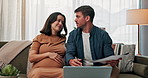 Laptop, pregnancy and paperwork with couple on sofa for life insurance update, documents and research. Maternity benefits, home and healthcare plan with man and woman in living room of family house