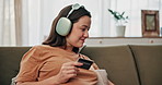 Pregnant woman, relax and credit card with smile for online shopping, maternity ecommerce and payment. Person, headphones and debit pin for medical expenses, baby items and pregnancy podcast at house