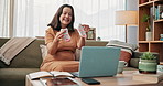 Baby clothes, laptop and video call with pregnant mother on sofa in living room of home for communication. Computer, smile and socks with happy woman in apartment to show newborn clothing purchase