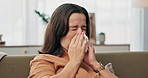 Blowing nose, tissue and sick with woman on sofa for hayfever, medical disease and influenza. Allergy, sneeze and sinus with person and handkerchief in living room at home for infection and virus