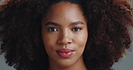 African woman, face and cosmetics with afro in studio, beauty and pride with results by background. Girl, model and portrait with natural hair care, growth and transformation with texture in Nigeria