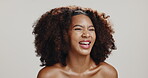 Beauty, laughing and smile with woman in studio for skincare, hydration and self care. Cosmetics, funny and dermatology with African person on white background for shine, spa treatment or facial glow