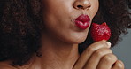 Strawberry, makeup and red lipstick with closeup of woman for glow, self care and vegan cosmetics. Shine, natural beauty and glamour with lips of person for aesthetic, mouth and cosmetology treatment